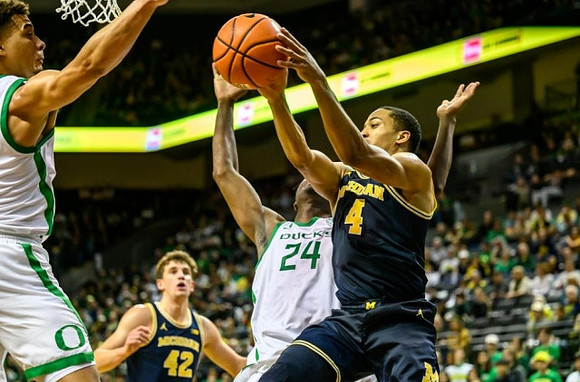 Will Tschetter (42) and Nimari Burnett (4)