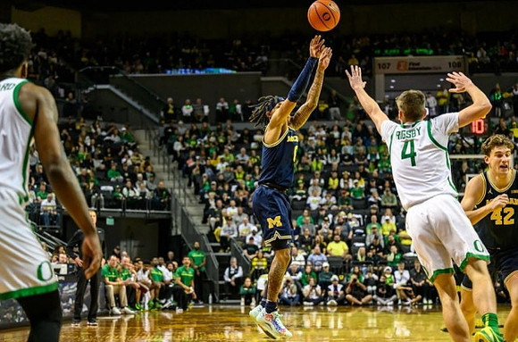 Dug McDaniel (0) and Will Tschetter (42)