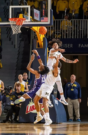 Tre Donaldson (3) and Roddy Gayle Jr. (11)