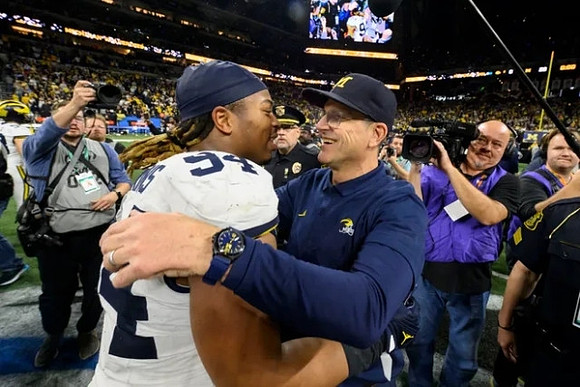 Kris Jenkins (94) and Jim Harbaugh