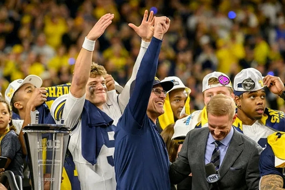 J.J. McCarthy (9), Jim Harbaugh, and Michigan Team
