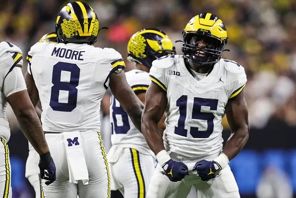 Derrick Moore (8), Quinten Johnson (28), and Ernest Hausmann (15)