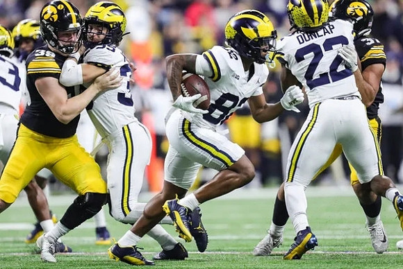 Caden Kolesar (35), Semaj Morgan (82), and Tavierre Dunlap (22)