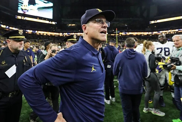 Jim Harbaugh and Kenneth Grant (78)