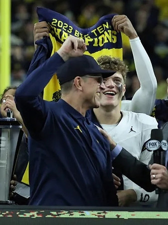Jim Harbaugh and J.J. McCarthy (9)