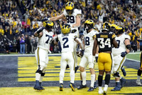 Trevor Keegan (77), Blake Corum (2), AJ Barner (89), Colston Loveland (18), and Drake Nugent (60)