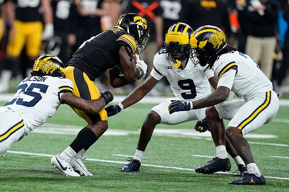 Junior Colson (25), Rod Moore (9), and Makari Paige (7)