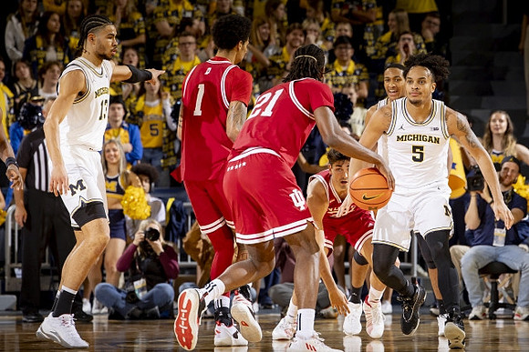 Olivier Nkamhoua (13), Nimari Burnett (4), and Terrance Williams II (5)
