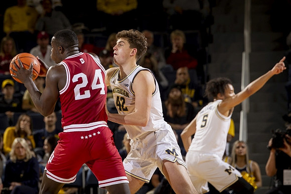 Will Tschetter (42) and Terrance Williams II (5)