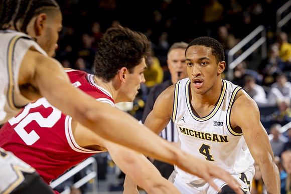 Olivier Nkamhoua (13) and Nimari Burnett (4)