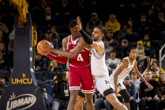 Olivier Nkamhoua (13) and Nimari Burnett (4)