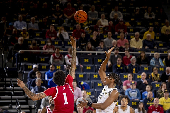 Tarris Reed Jr. (32) and Terrance Williams II (5)