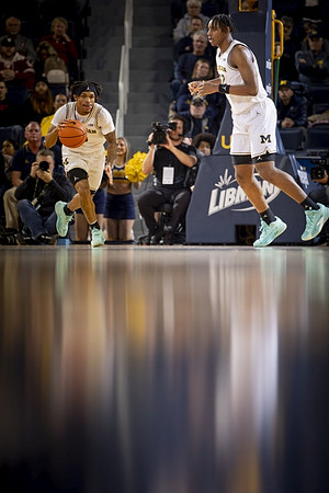 Dug McDaniel (0) and Tarris Reed Jr. (32)