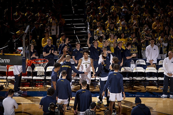 Terrance Williams II (5) and Michigan Team