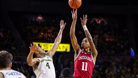 Nimari Burnett (4) and Will Tschetter (42)