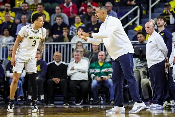 Jaelin Llewellyn (3), Juwan Howard, and Phil Martelli