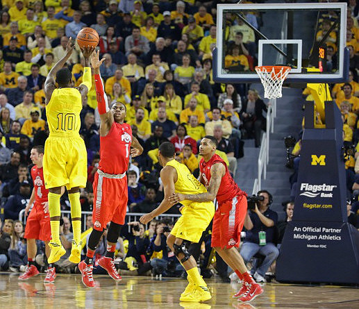 Tim Hardaway Jr. (10) and Jon Horford (15)