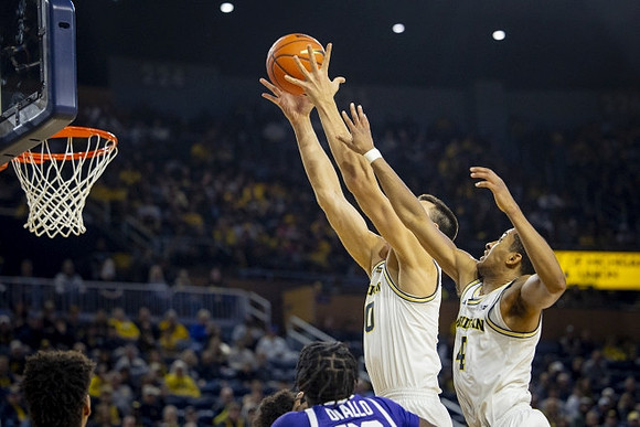 Vladislav Goldin (50) and Nimari Burnett (4)