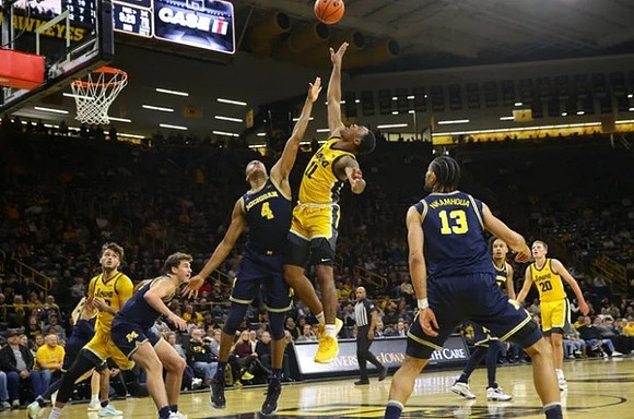 Will Tschetter (42), Nimari Burnett (4), Olivier Nkamhoua (13), and Terrance Williams II (5)