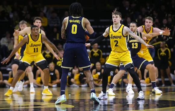 Will Tschetter (42), Dug McDaniel (0), and Olivier Nkamhoua (13)
