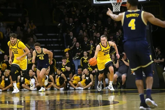 Will Tschetter (42) and Nimari Burnett (4)