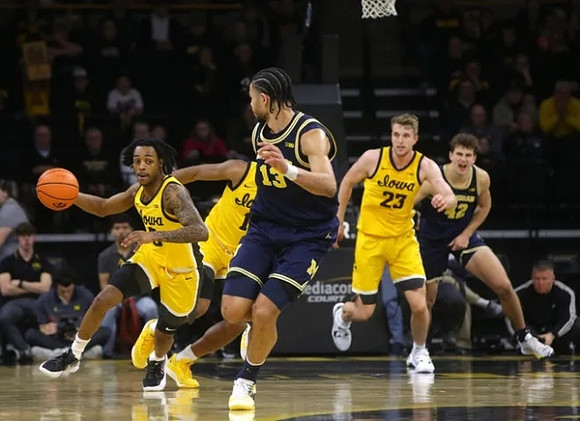 Olivier Nkamhoua (13) and Will Tschetter (42)