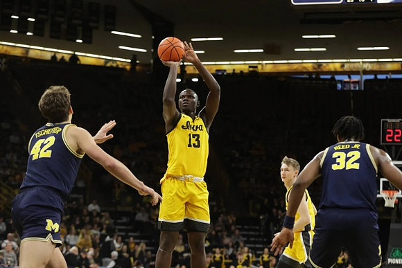 Will Tschetter (42) and Tarris Reed Jr. (32)