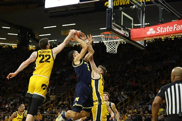 Olivier Nkamhoua (13) and Will Tschetter (42)