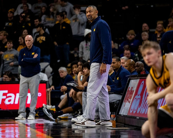 Phil Martelli, Howard Eisley, and Juwan Howard