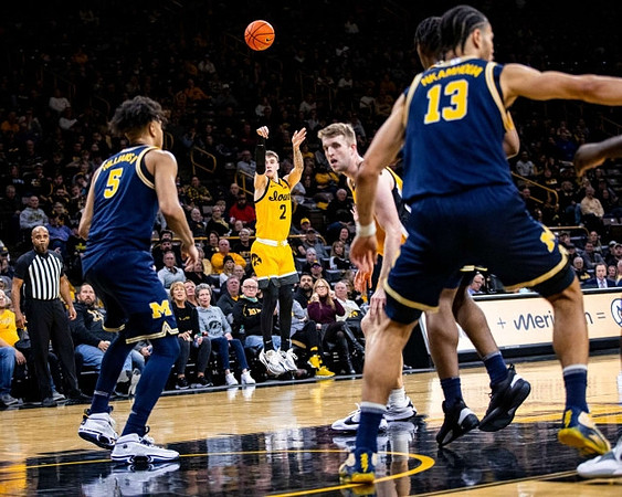 Terrance Williams II (5) and Olivier Nkamhoua (13)