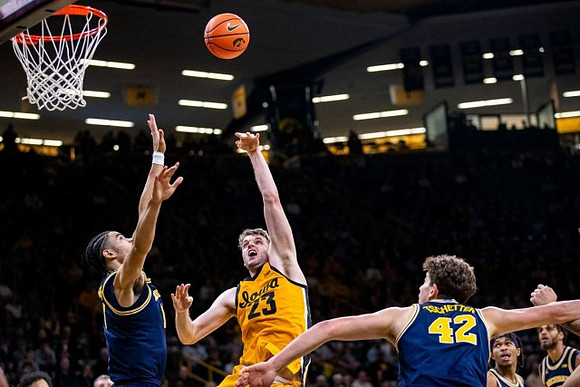 Olivier Nkamhoua (13) and Will Tschetter (42)