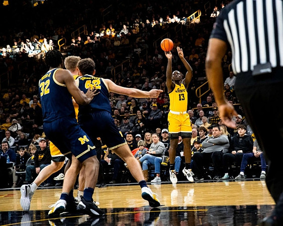 Tarris Reed Jr. (32) and Will Tschetter (42)