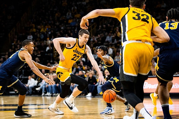 Nimari Burnett (4), Dug McDaniel (0), and Olivier Nkamhoua (13)