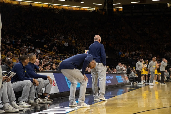 Howard Eisley, Juwan Howard, Saddi Washington, and Phil Martelli