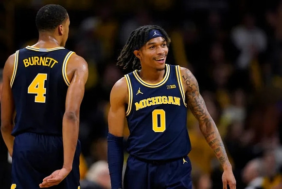 Nimari Burnett (4) and Dug McDaniel (0)