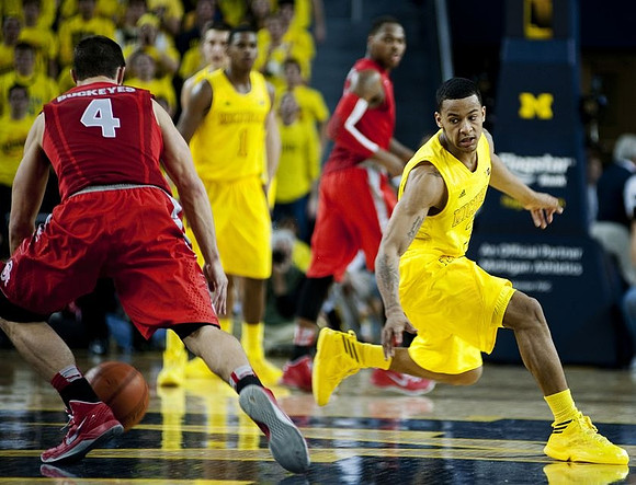Glenn Robinson III (1) and Trey Burke (3)