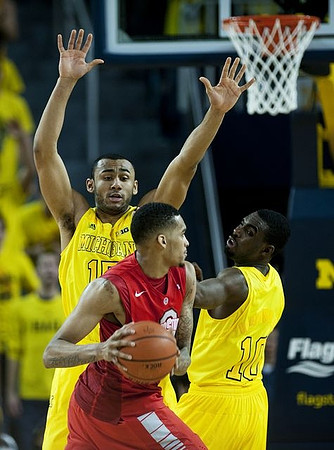 Jon Horford (15) and Tim Hardaway Jr. (10)