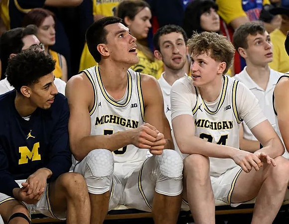 Justin Pippen (10), Vladislav Goldin (50), and Sam Walters (24)