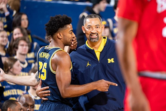 Youssef Khayat (24) and Juwan Howard