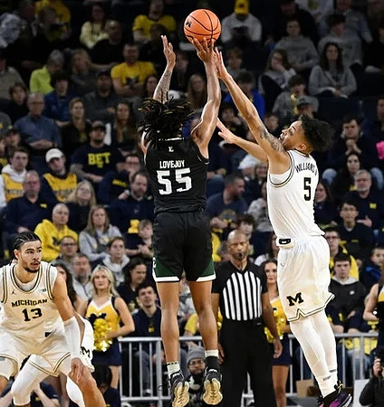 Olivier Nkamhoua (13) and Terrance Williams II (5)