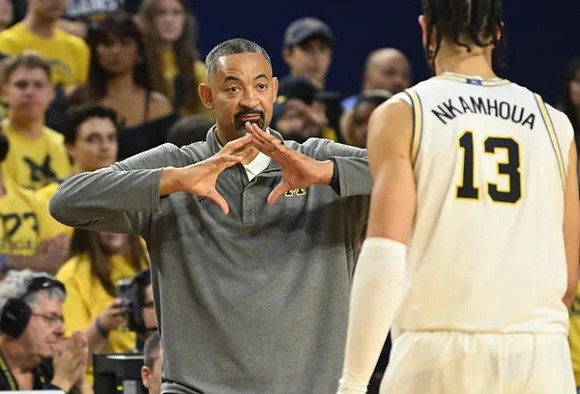 Juwan Howard and Olivier Nkamhoua (13)