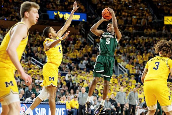 Danny Wolf (1), Nimari Burnett (4), and Tre Donaldson (3)