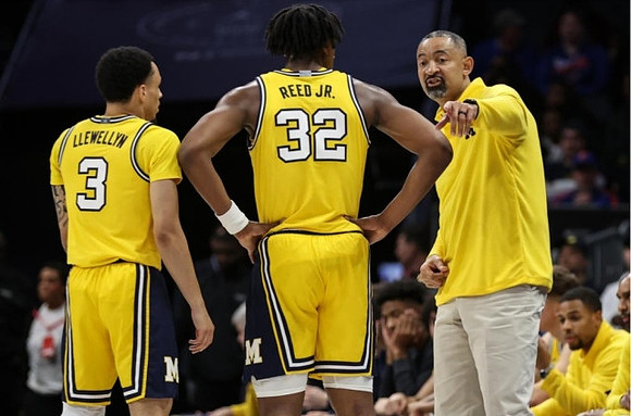 Jaelin Llewellyn (3), Tarris Reed Jr. (32), and Juwan Howard