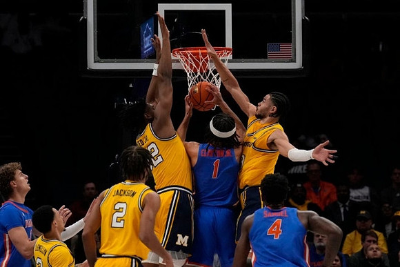 Jaelin Llewellyn (3), Tray Jackson (2), Tarris Reed Jr. (32), and Olivier Nkamhoua (13)