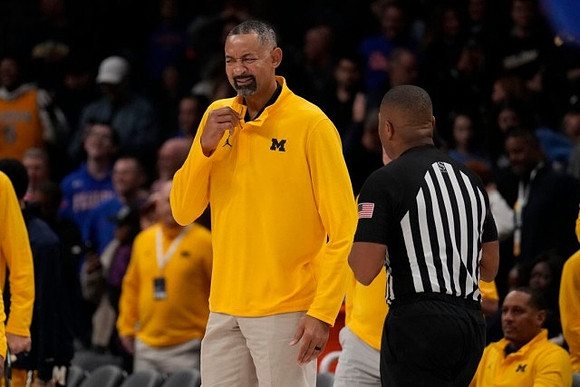 Juwan Howard and Howard Eisley