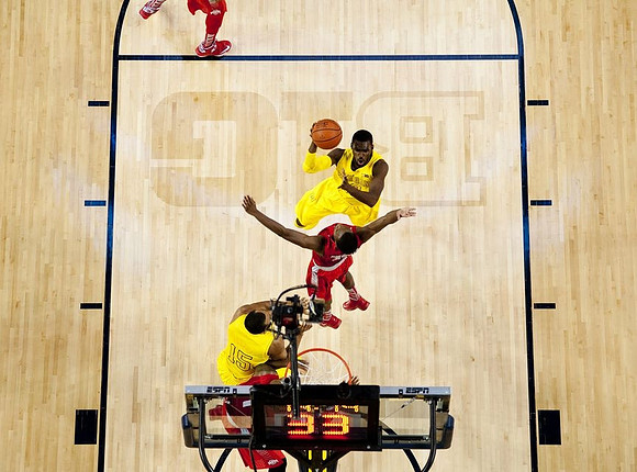 Tim Hardaway Jr. (10) and Jon Horford (15)