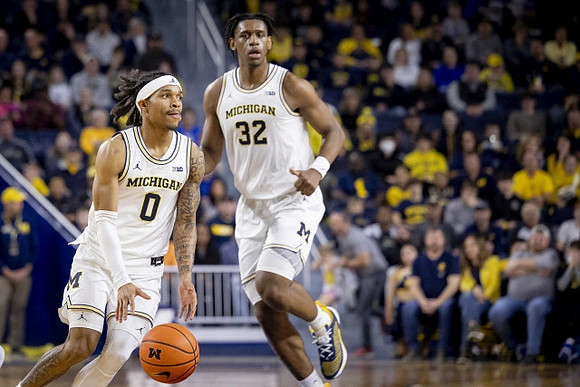 Dug McDaniel (0) and Tarris Reed Jr. (32)