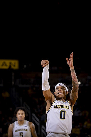 Terrance Williams II (5) and Dug McDaniel (0)