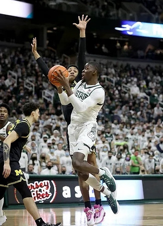 Brandon Johns Jr. (23) and Kobe Bufkin (2)
