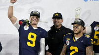 J.J. McCarthy (9), Juwan Howard, and Blake Corum (2)